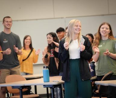 Doane students standing in a classroom